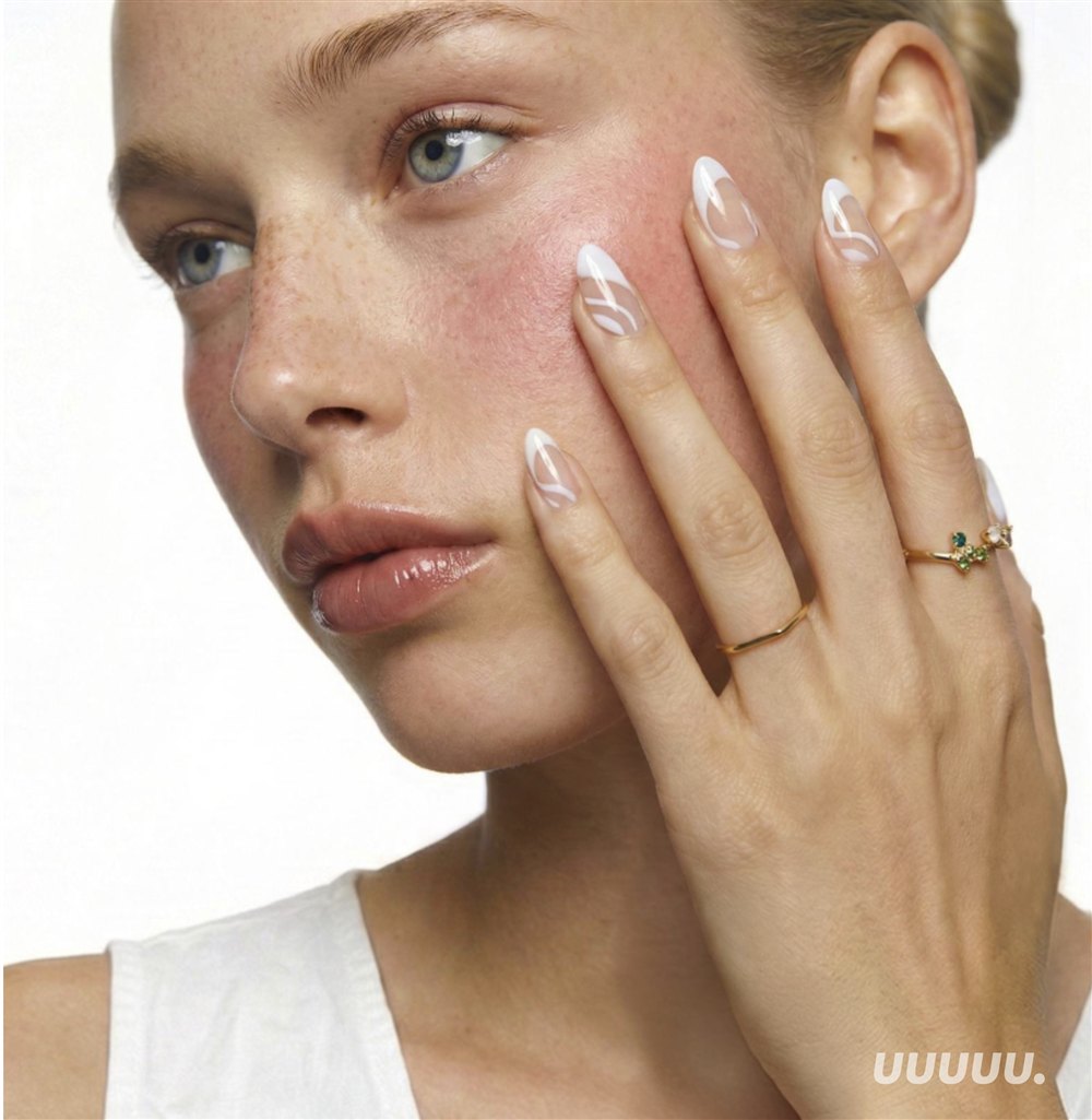 Model showcasing UUUUU self-care beauty brand nail design